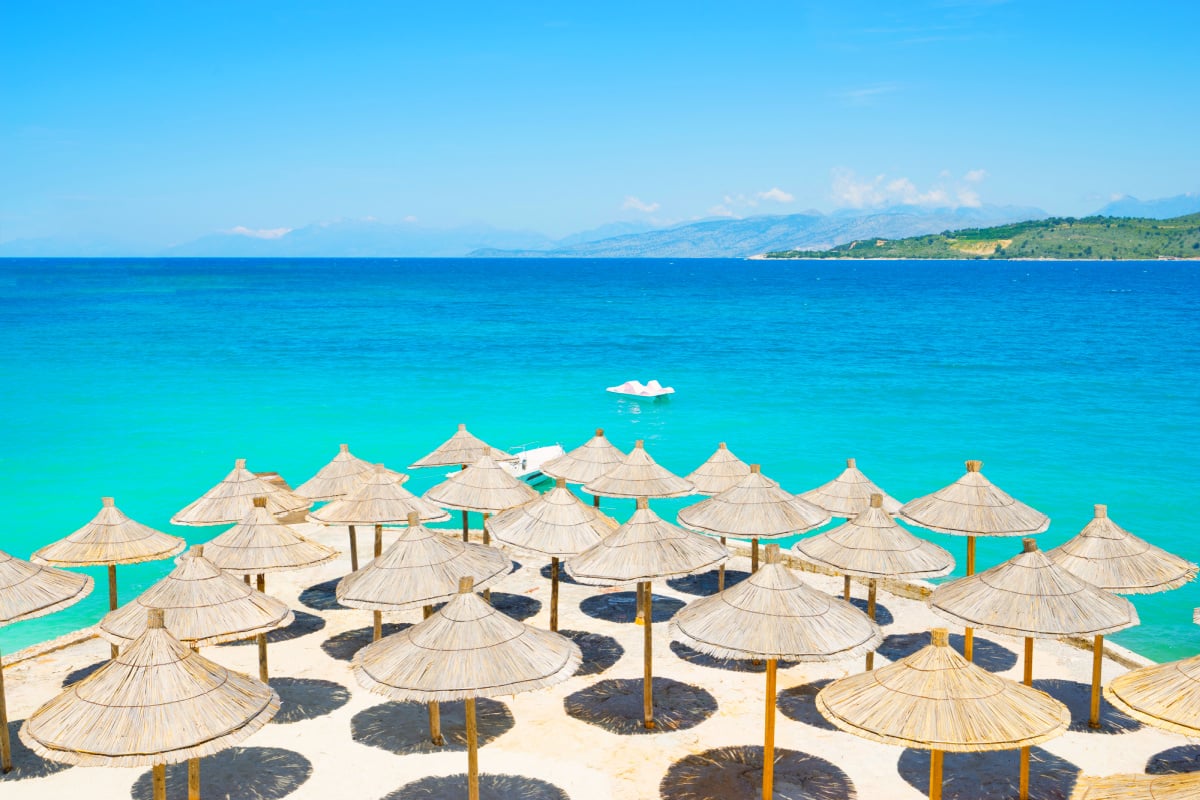 umbrellas on a beach in ksamil, saranda, albania